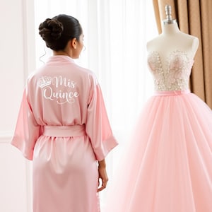 Personalized blush pink quinceanera robes.