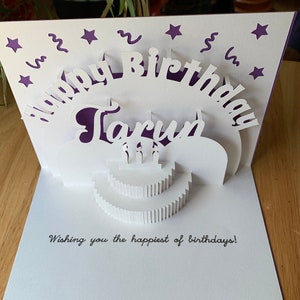 Personalized 3D pop up cake card for Birthday with name and age. Make someone's birthday extra special by giving them this thoughtful card.