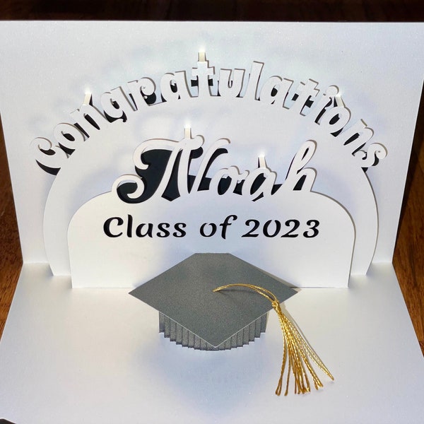 Personalized 3D Graduation pop up card with 3D hat and tassel. Celebrate their Graduation Day with a One-of-a-kind card made just for them.