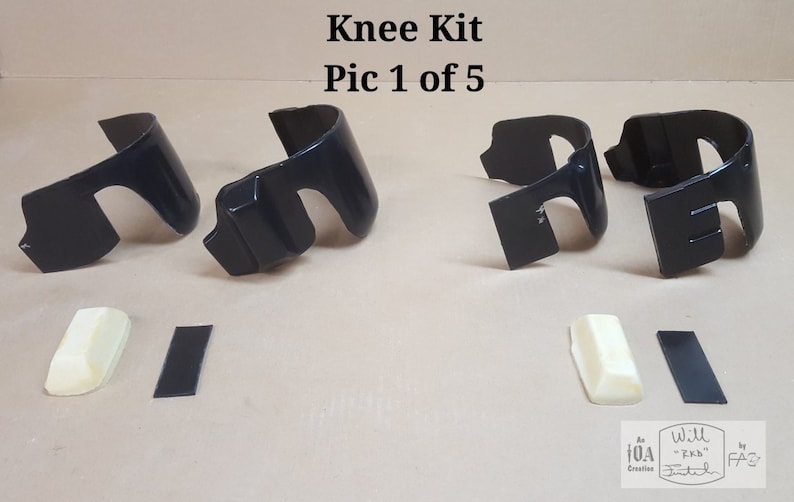 May include: A set of four black knee pads for motorcycles. The set includes two knee pads, two foam pads, and two black strips. The knee pads are made of a hard plastic material and have a curved shape. The foam pads are white and are designed to be placed under the knee pads for added comfort. The black strips are designed to be attached to the knee pads to help keep them in place.