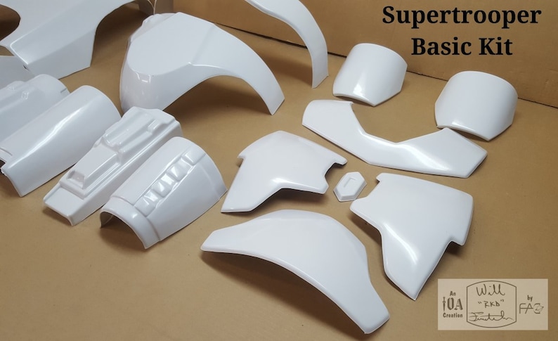 May include: A white plastic kit for making a Supertrooper costume. The kit includes pieces for the chest, shoulders, arms, and legs.