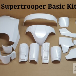 May include: A white plastic Supertrooper Basic Kit for cosplay. The kit includes 14 pieces, including the chest, back, shoulders, arms, and legs.