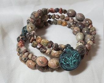 Leopardskin Rice Jasper gemstone beads make up this beautifully patterned Memory wire bracelet