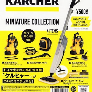 Puede incluir: Colección de limpieza Kärcher en miniatura con una hidrolimpiadora amarilla y negra, una limpiadora a vapor y accesorios. La imagen incluye texto en japonés e inglés, con el precio de ¥500.
