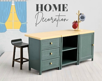 May include: A green cabinet with three drawers and a shelf, a green cabinet with a door, and a black stool. The cabinet is labeled "HOME Decoration".