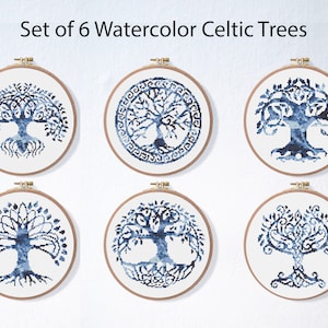 May include: Set of six watercolour Celtic tree embroidery patterns in blue and white, displayed in wooden embroidery hoops.