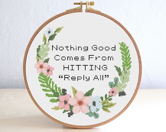 Puede incluir: Un aro de bordado blanco con un diseño de corona floral y el texto "Nothing Good Comes From Hitting "Reply All"".