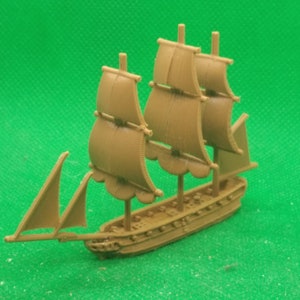 May include: A brown miniature model of a sailing ship with three sails and a brown hull.