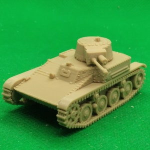 May include: A beige plastic model of a tank with a rotating turret and wheels. The tank is on a green surface.