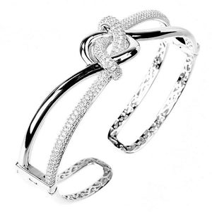 Sterlingzilveren Love Knot-manchetarmband: effen CZ Eternity-armband