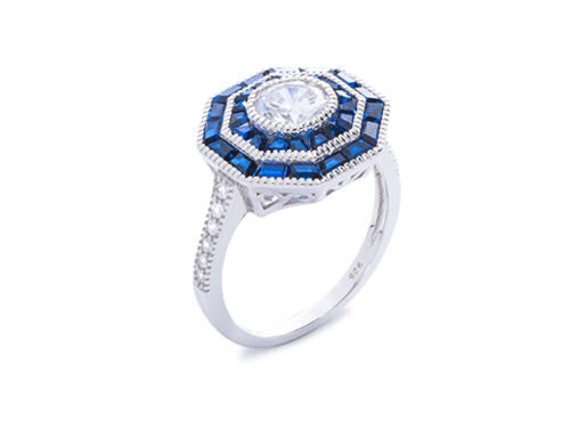 Octagon Shape Pave Cubic Zirconia Ring with Square CZ Center Rhodium on Silver Octagon Shape Pave Cubic Zirconia Ring with Square CZ Center Rhodium on Silver