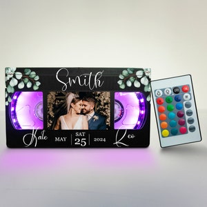 Personalized Retro VHS Lamp featuring wedding, party, anniversary, engagement. A unique gift made especially for you.  Custom VHS tapes