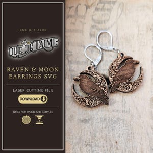 May include: A pair of wooden raven and moon earrings with silver ear wires. Each earring depicts a raven on a crescent moon with detailed scrollwork. The image includes the text "QUE JE T'AIME" and "RAVEN & MOON EARRINGS SVG".