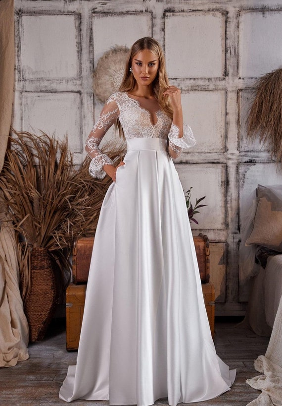 wedding dress fitted with sleeves Modern Trendy Ivory Ruffle Long Sleeve Fitted Front Slit Bridal Dress 44