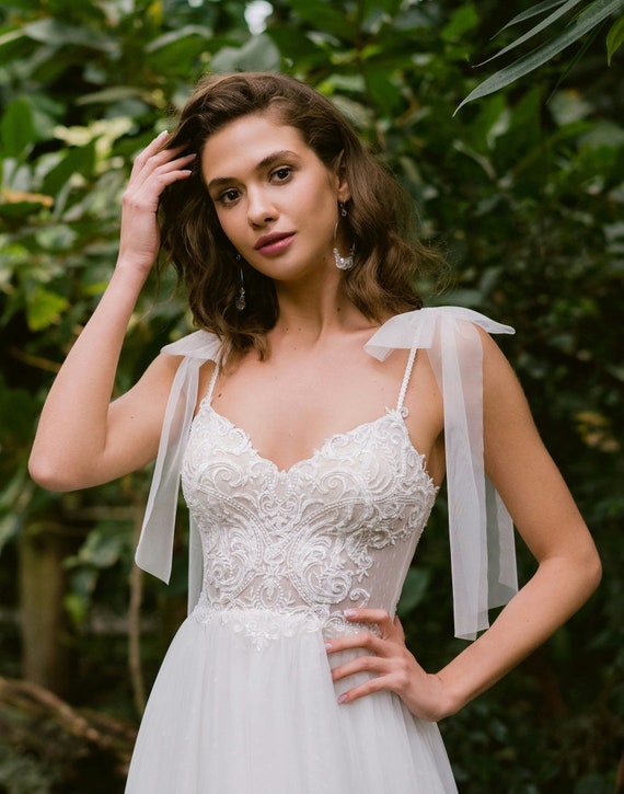 Dreamy Polka Dot Tulle Wedding Dress: Spaghetti Strap A-Line Gown Dreamy Polka Dot Tulle Wedding Dress: Spaghetti Strap A-Line Gown