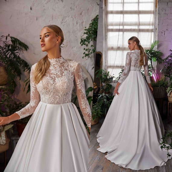 long sleeve wedding dresses the knot Long Sleeve Wedding Dresses