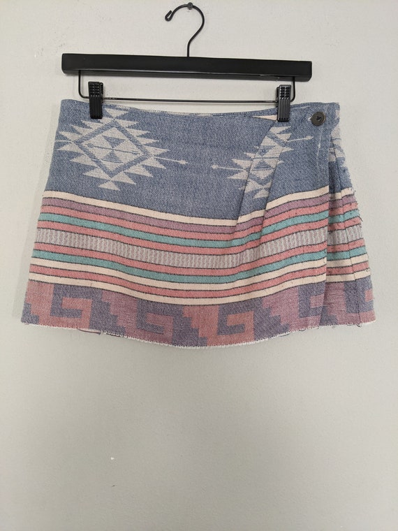 The Limited Mini Wrap Skirt with button closure