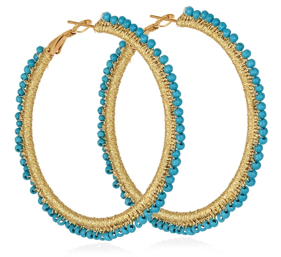 Aenaos Hoops (aenh502) Steel hoops, turquoise howlite beads and gold thread.