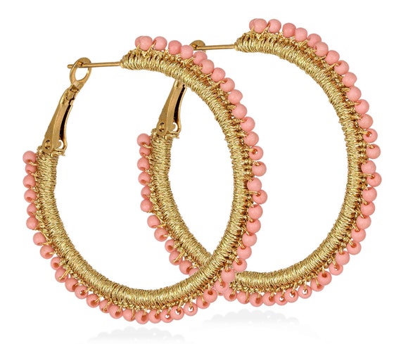 Aenaos Hoops (aenh404) Steel hoops, pink howlite beads and gold thread.