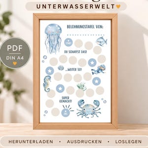 Può includere: Una tabella dei premi in una cornice di legno con un tema sottomarino che include illustrazioni di medusa, cavalluccio marino, granchio e subacqueo. Il testo include Belohnungstafel, Unterwasserwelt, Belohnungstafel von, Start, Du schaffst das, Weiter so, Super gemacht, Ziel, PDF e DIN A4.