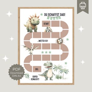 May include: A printable dinosaur-themed board game for children. The game board features a brown path with green accents and stars. The game includes a start and finish line, and the text "Du schaffst das!" (You can do it!) is at the top of the board.