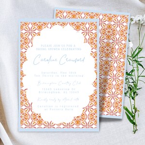 May include: A bridal shower invitation with a colorful tile pattern border. The invitation is for Caroline Crawford and includes the date, time, and location of the event. It also states that gifts can be purchased at Pottery Barn.