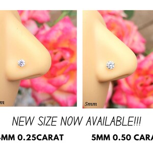 May include: Two close-up images of a nose piercing with a clear round gemstone. The left image shows a 4mm stone and the right image shows a 5mm stone. The text below the images reads "NEW SIZE NOW AVAILABLE!!! 4MM 0.25CARAT 5MM 0.50 CARAT".