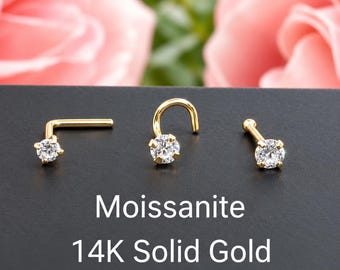May include: Three gold nose studs featuring round, clear moissanite stones set in 14K solid gold. The set includes an L-shaped post, a curved screw post, and a straight ball-end post. Text on the image reads: Moissanite 14K Solid Gold.