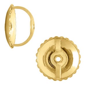 May include: A pair of gold-tone earring backs. The backs are round with a scalloped edge and a small hole in the center. The backs are designed to be used with post earrings.