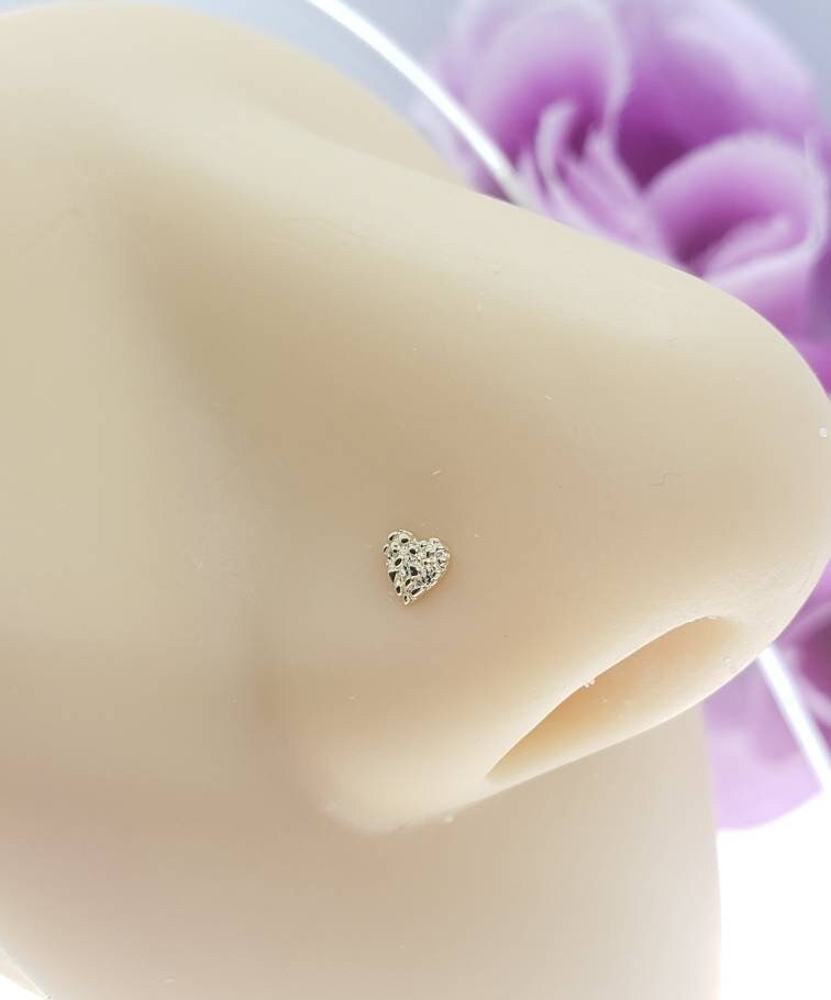 Gold nugget shop piercing