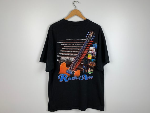 Vintage Delta Rock Ages 1950-2001 T-shirt Pink Fl… - image 1