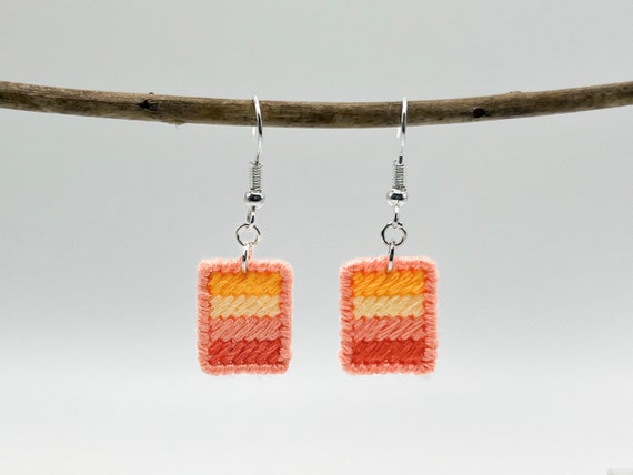 Coral sunshine hand-embroidered striped dangle earrings | Modern lightweight handmade geometric jewelry
