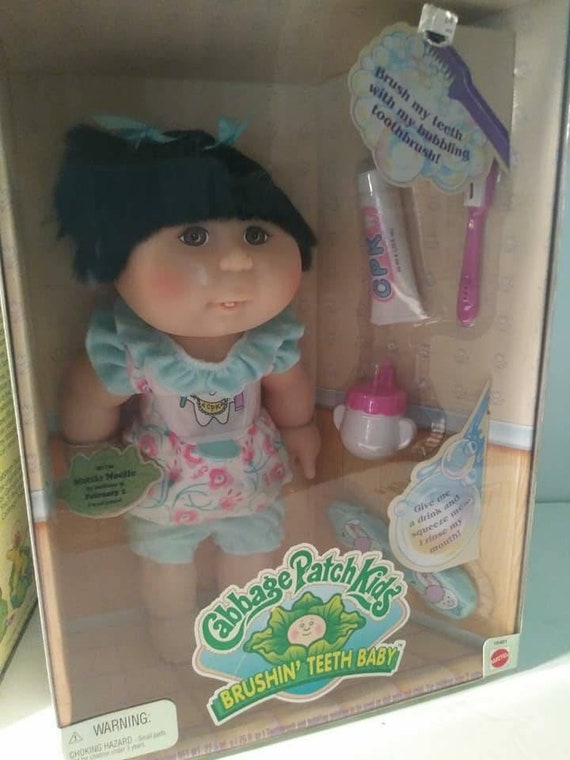 cabbage patch doll with teeth
