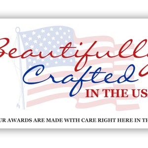 May include: A white card with a red, white, and blue American flag and the text "Beautifully Crafted in the USA". The text "All our awards are made with care right here in the USA" is at the bottom of the card.