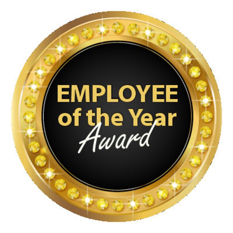 May include: A gold circular award with a black center and the text "EMPLOYEE of the Year Award" in white. The award is surrounded by a ring of gold stars.