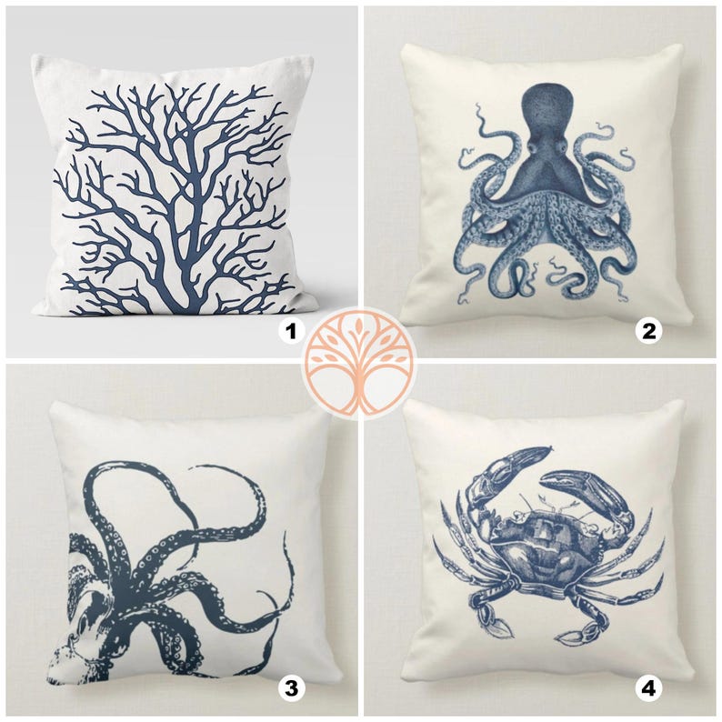 Four white throw pillow covers with blue nautical designs. The designs include a coral branch, an octopus, a crab, and another octopus.