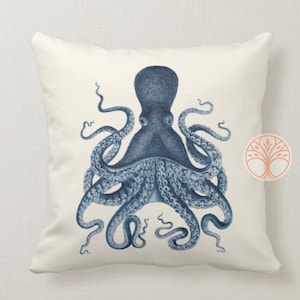 A blue and white throw pillow with a vintage illustration of an octopus with eight tentacles.