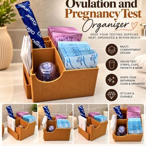 May include: A tan, multi-compartment organizer for ovulation and pregnancy tests. It holds a blue Clearblue test, white test strips, a purple plastic cup, and rows of light blue and purple test packets. Text reads: Ovulation and Pregnancy Test Organizer.