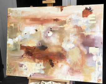 May include: Abstract painting on canvas with brown, beige, and white colors. The painting is on an easel with the word "MEEDEN" printed on the easel.