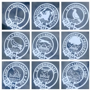 May include: Nine different heraldic crests, each with a unique design and motto. The crests are white on a blue background. The mottos are in Gaelic and Latin.