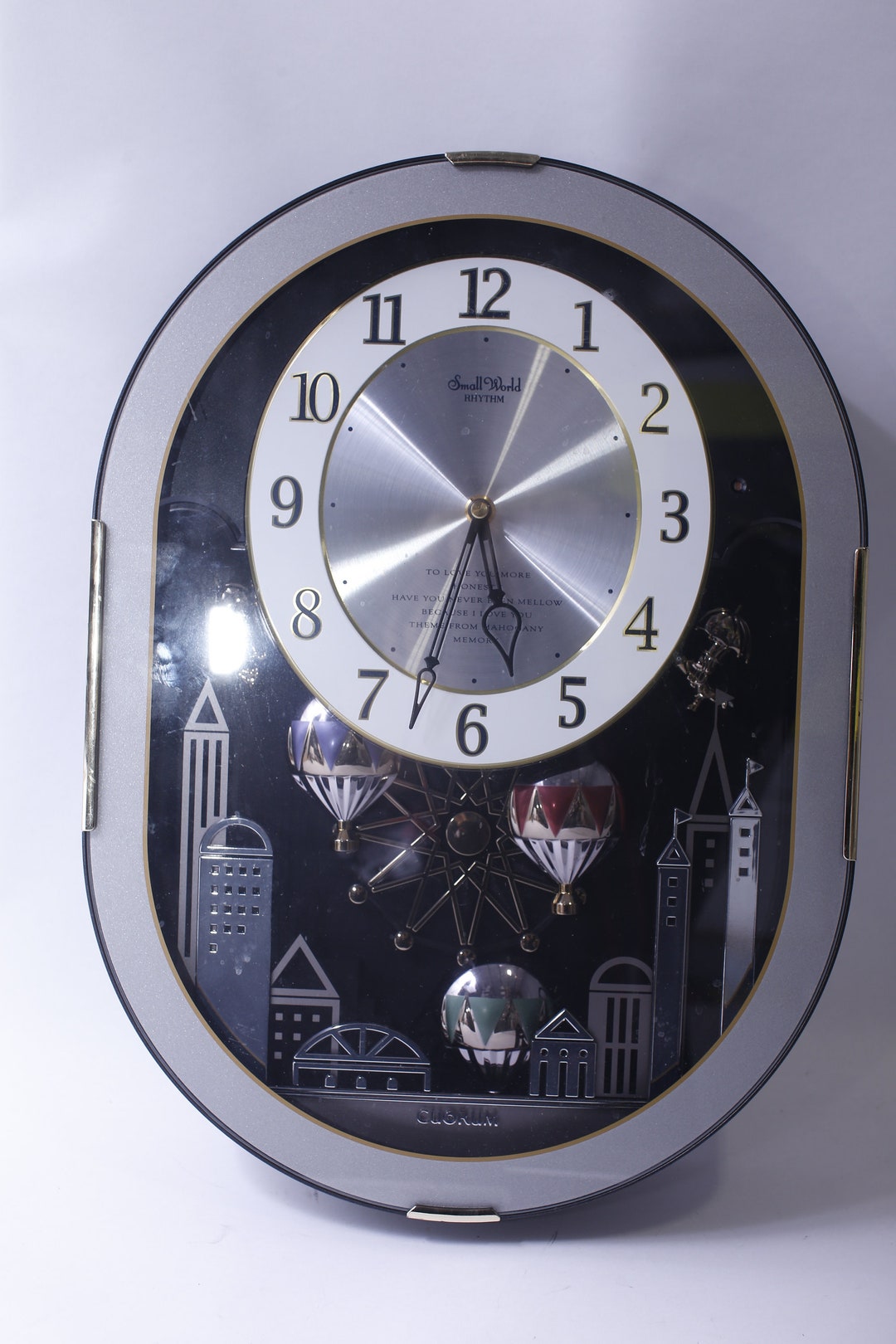 Cuorum, Small World Rhythm, Melody Wall Clock, 14x18 Inches, Arabic