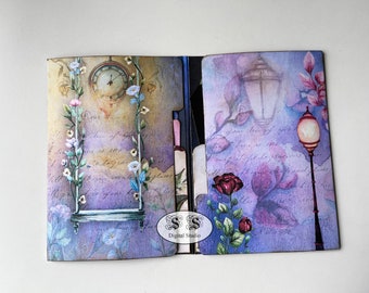 Peut inclure: Un album à scrapbooking violet et bleu avec un motif floral. Le côté gauche présente une horloge et une balançoire, tandis que le côté droit présente un lampadaire et une rose.