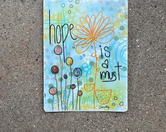 Hope is a must…  Sticker / inspirational. Heart. Flowers
