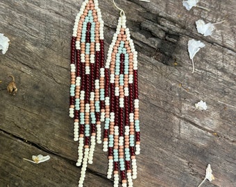 Handwoven cream, celadon, and maroon fringe earrings