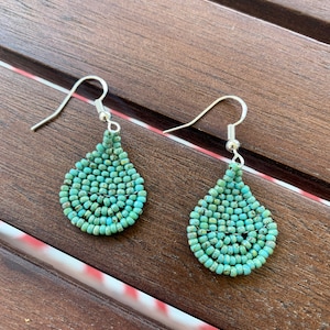 small turquoise teardrop handwoven native american earrings