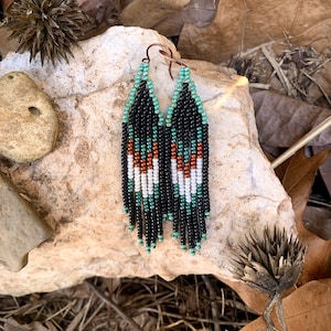 Small teal, black, dark copper and turquoise hand beaded earrings