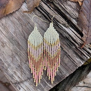 Neutral pink toned beaded fringe earring with gold accents