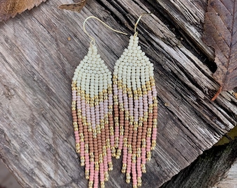 Neutral pink toned beaded fringe earring with gold accents