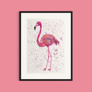 May include: A pink flamingo with a long neck and long legs stands on a white background with colorful paint splatters.