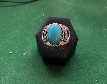 Zilveren en turquoise ring